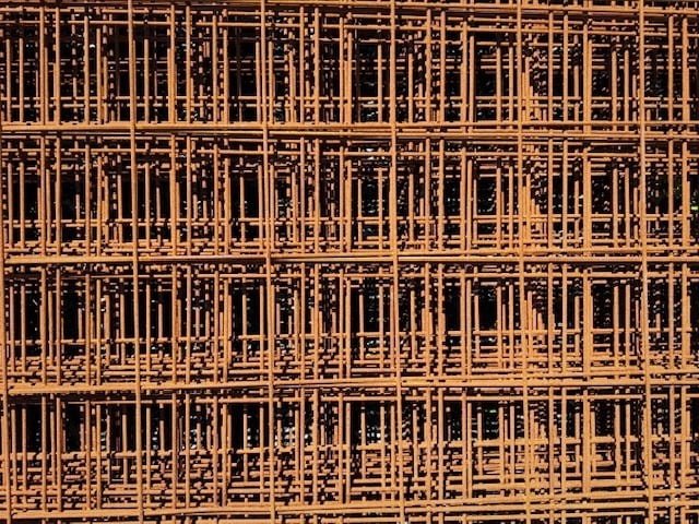 Sheets of reinforcing steel mesh stacked on site