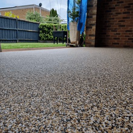 A finished concrete driveway