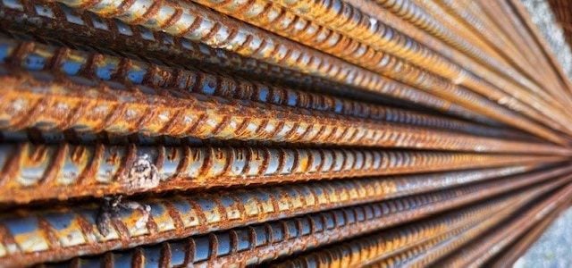 A bundle of reinforcing steel bars, close up
